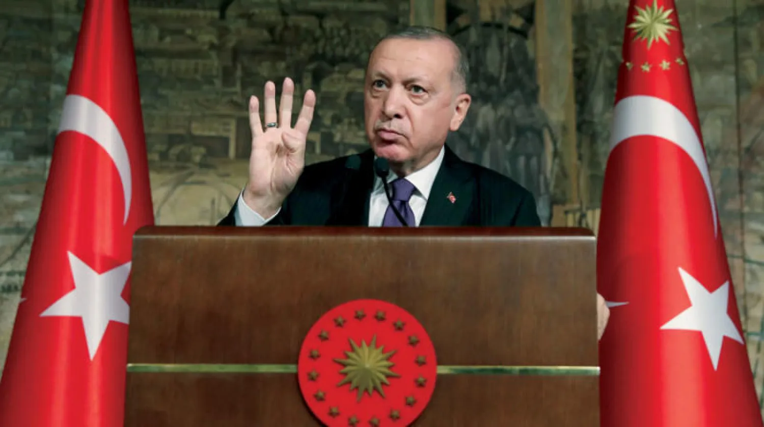 أكد إردوغان أمس الجمعة أنه لن يجري انتخابات مبكرة تحت أي ظرف (أ.ب)