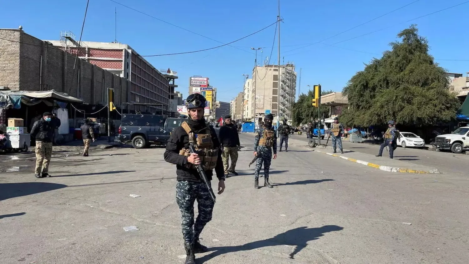 Iraqi security forces secure the site of a suicide attack in Baghdad, Iraq January 21, 2021. (Reuters)