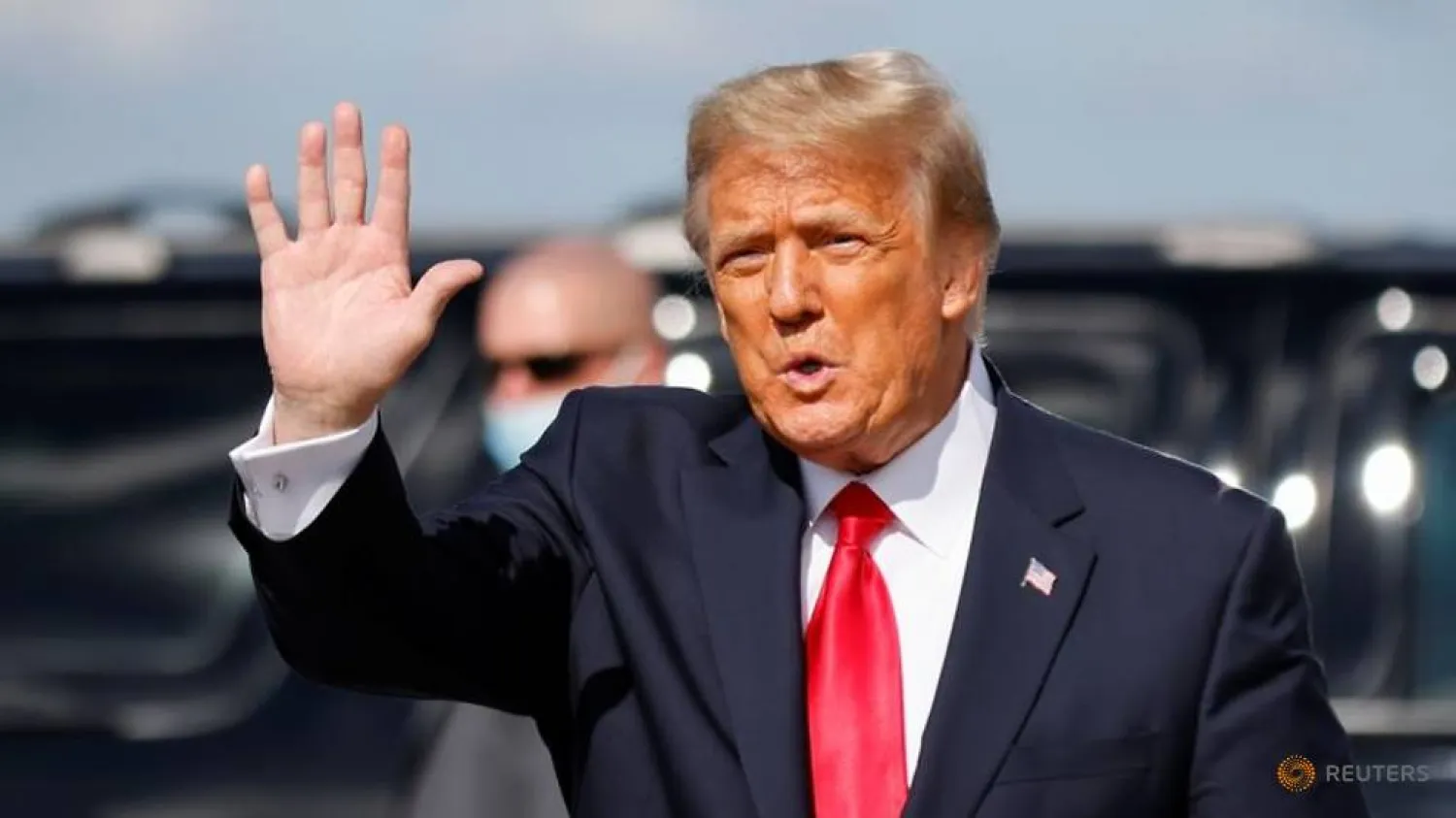 FILE PHOTO: US President Donald Trump waves as he arrives at Palm Beach International Airport in West Palm Beach, Florida, US, January 20, 2021. REUTERS/Carlos Barria