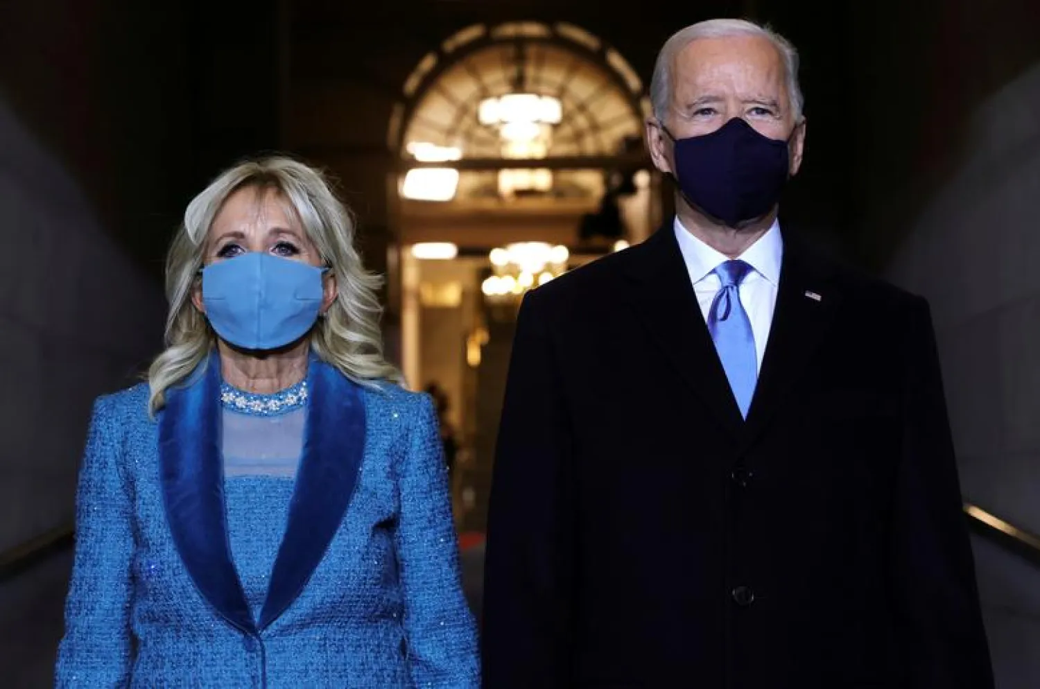 President-elect Joe Biden and Jill Biden arrive at his inauguration on the West Front of the US Capitol in Washington, January 20, 2021. Win McNamee/Pool via REUTERS