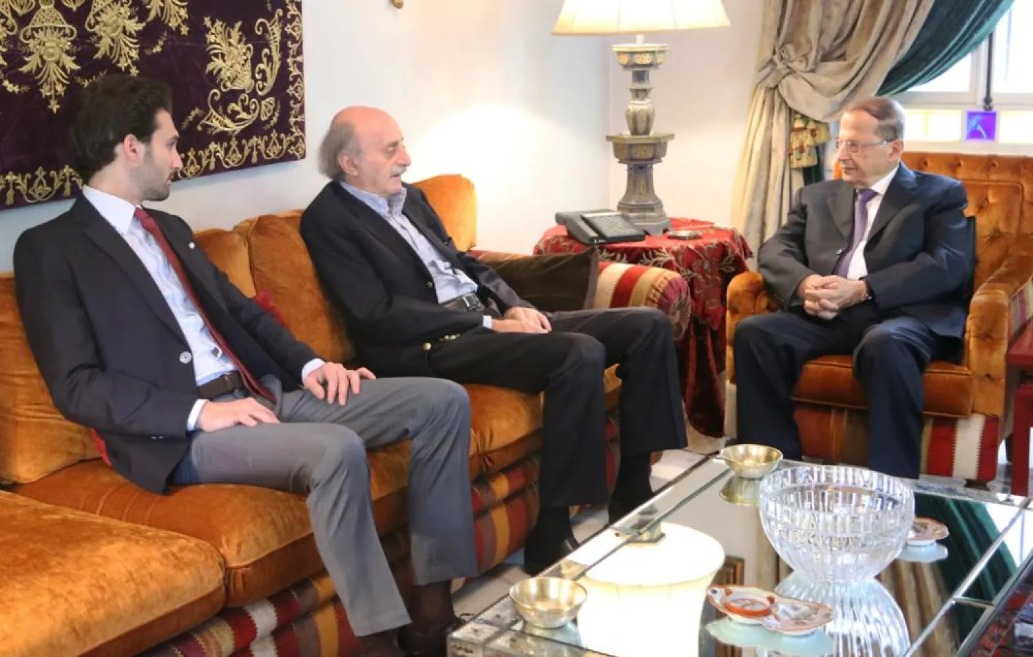PSP leader Walid Jumblatt receives then FPM chief Michel Aoun at his Clemenceau residence in 2014. (NNA file photo)