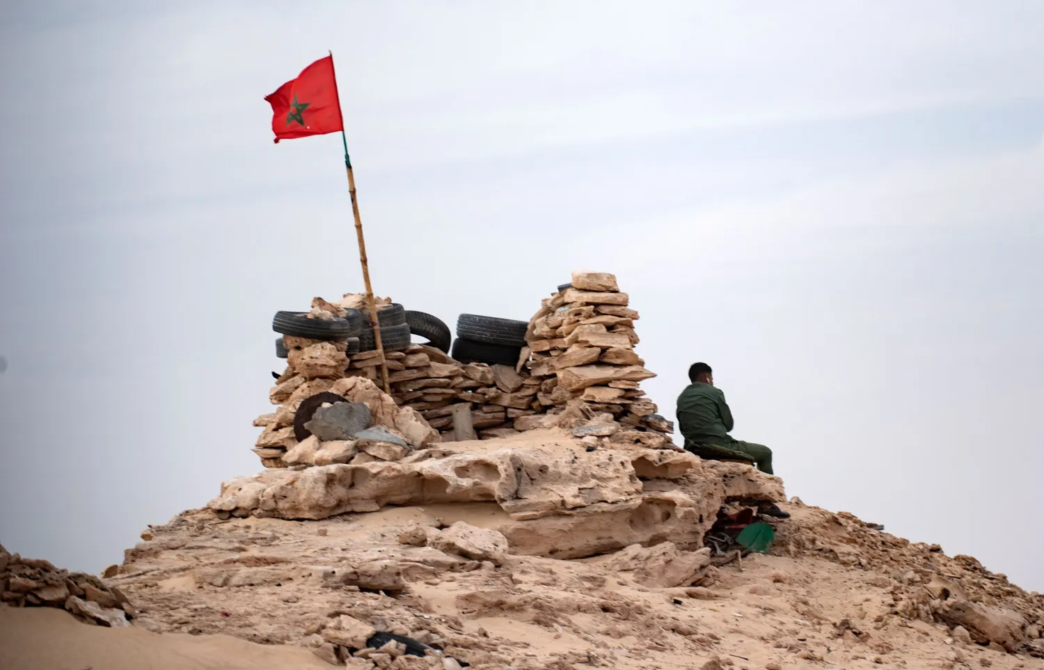 A Moroccan soldier is pictured on a hilltop on a road between Morocco and Mauritania in Guerguerat located in Western Sahara, Nov. 23, 2020. (AFP Photo)