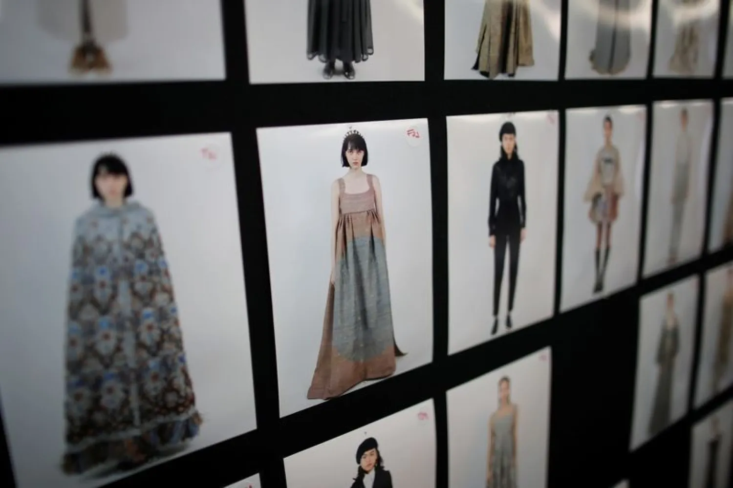 The lookbook by Dior's designer Maria Grazia Chiuri is seen during a fitting session for the Spring/Summer 2021 Haute Couture collection presentation in a digital format at Dior fashion house in Paris, France, January 20, 2021. (Reuters)