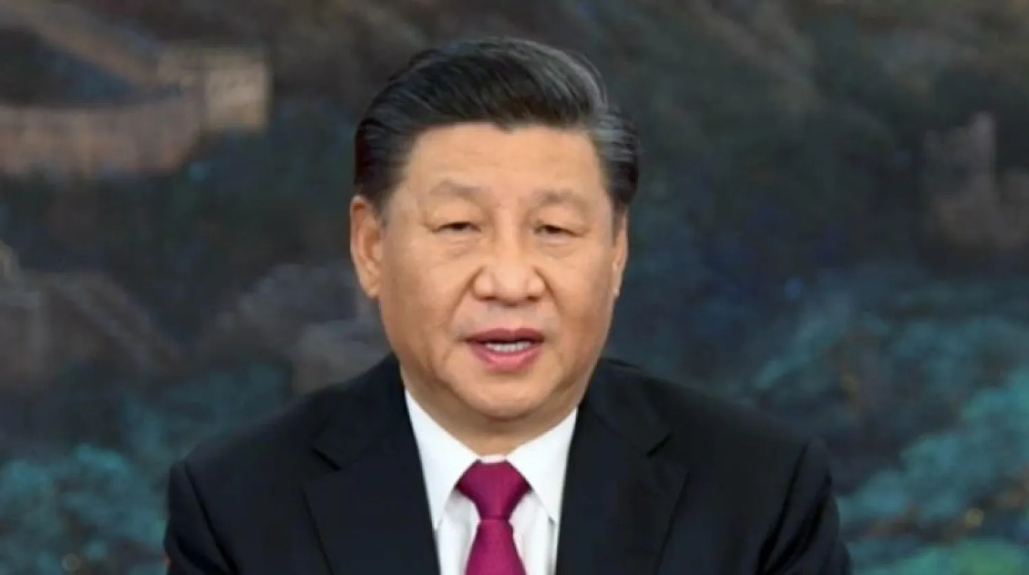 الرئيس الصيني يتحدث عبر الفيديو في مؤتمر «دافوس» أمس (إ.ب.أ)