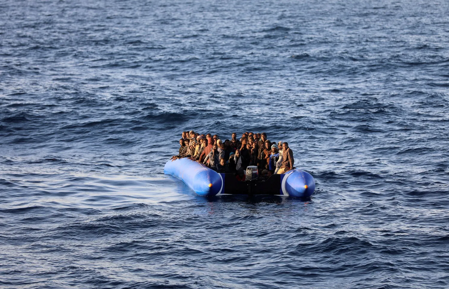 Migrants in a dinghy are rescued by Libyan coast guards off the coast of Garabulli, east of Tripoli, Libya, Jan. 8, 2018. Reuters file photo
