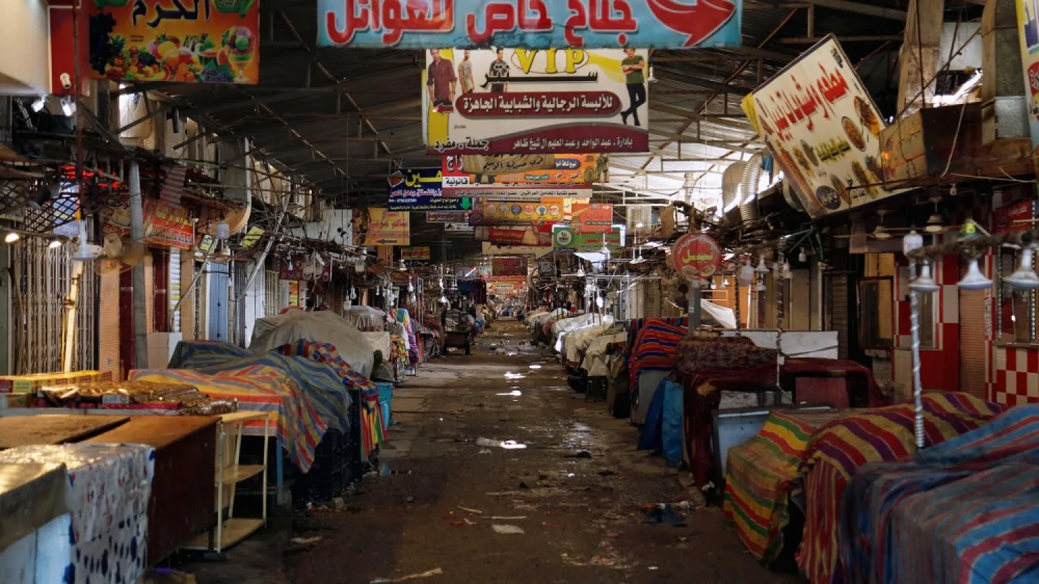 Nabi Younes market is seen empty during a curfew imposed by the Iraqi authorities, following the outbreak of the coronavirus, in east Mosul, Iraq, March 15, 2020. (Reuters)