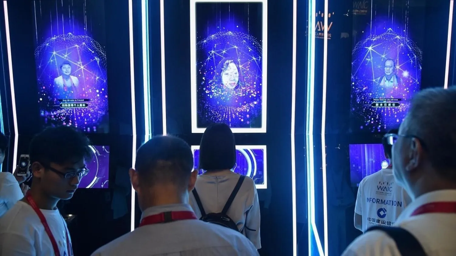 People have their faces scanned as they arrive for the opening ceremony of the World Artificial Intelligence Conference (WAIC) in Shanghai on August 29, 2019. (AFP)