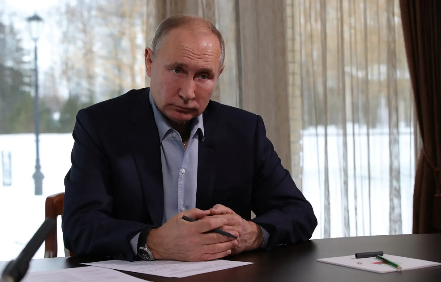 Russian President Putin attends a meeting with university students via a video conference call in Zavidovo, Russia, January 25, 2021. (Kremlin via Reuters)