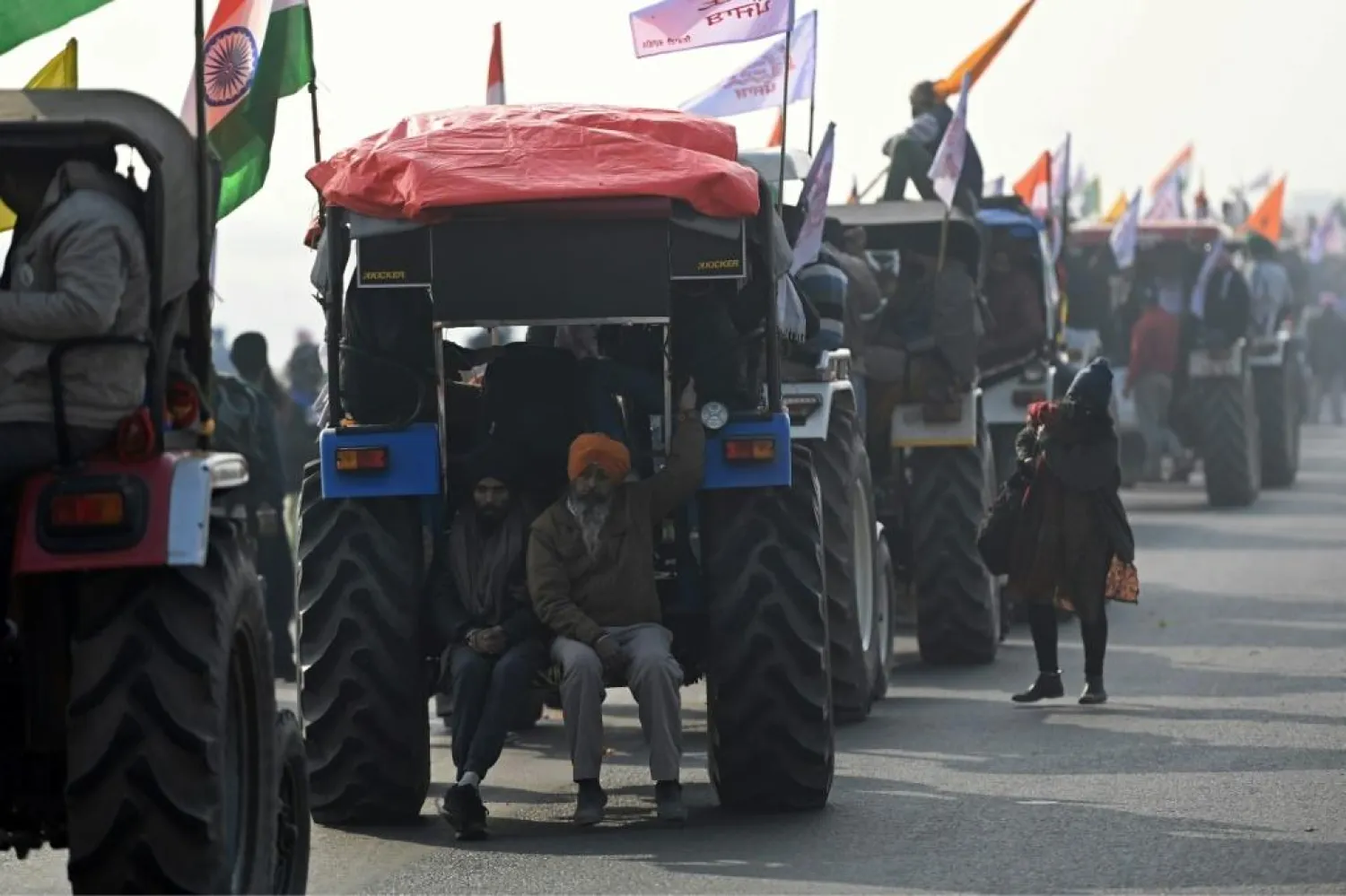 Farmers have been camped on key roads into the capital for two months, protesting against new laws which deregulate produce markets | AFP