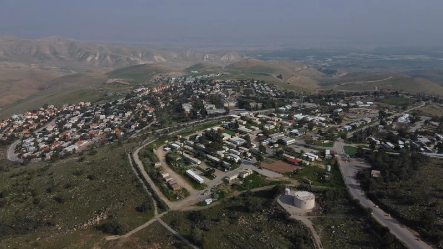 FILE - In this Tuesday, Feb. 18, 2020 photo, a view of the West Bank settlement of Ma'ale Efraim on the hills of the Jordan Valley. (AP Photo/Ariel Schalit)
