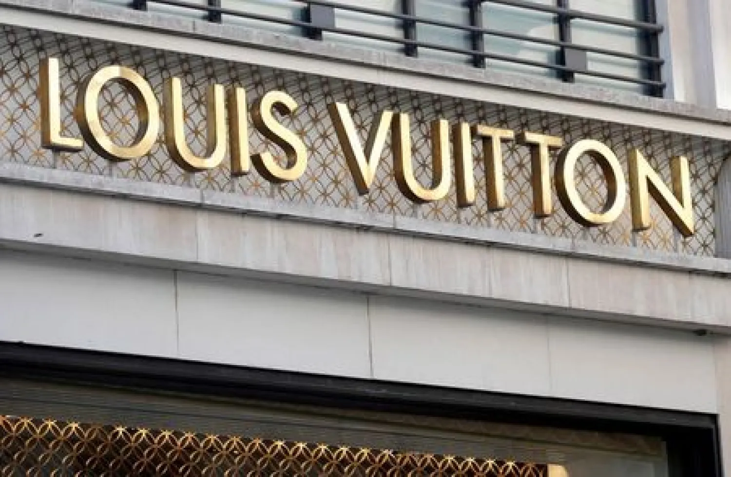 FILE PHOTO: A Louis Vuitton logo is seen outside a store on the Champs-Elysees in Paris, France, September 18, 2020. REUTERS/Charles Platiau