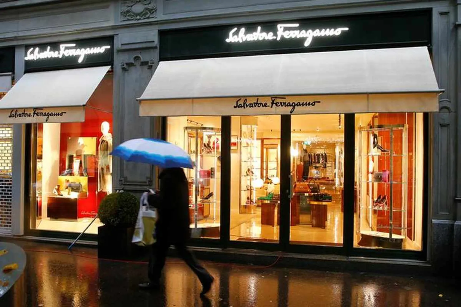 Italian luxury fashion house Salvatore Ferragamo's logo is seen at a store in Zurich, Switzerland October 26, 2016. REUTERS/Arnd Wiegmann
