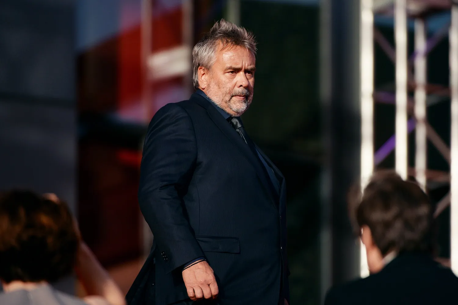  French director Luc Besson arrives for the red carpet event
during the opening ceremony of the fifth Beijing International Film
Festival at Yanqi Lake on April 16, 2015.BY WANG ZHAO/AFP/GETTY
IMAGES.
