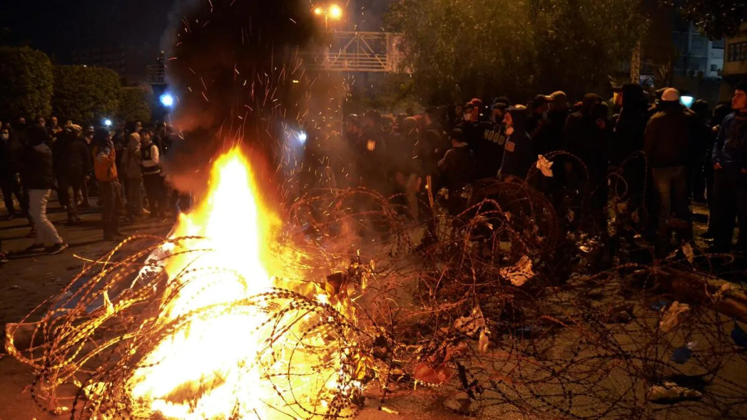 Lebanese protesters burn garbage and tires during a protest in Tripoli, north Lebanon. AP