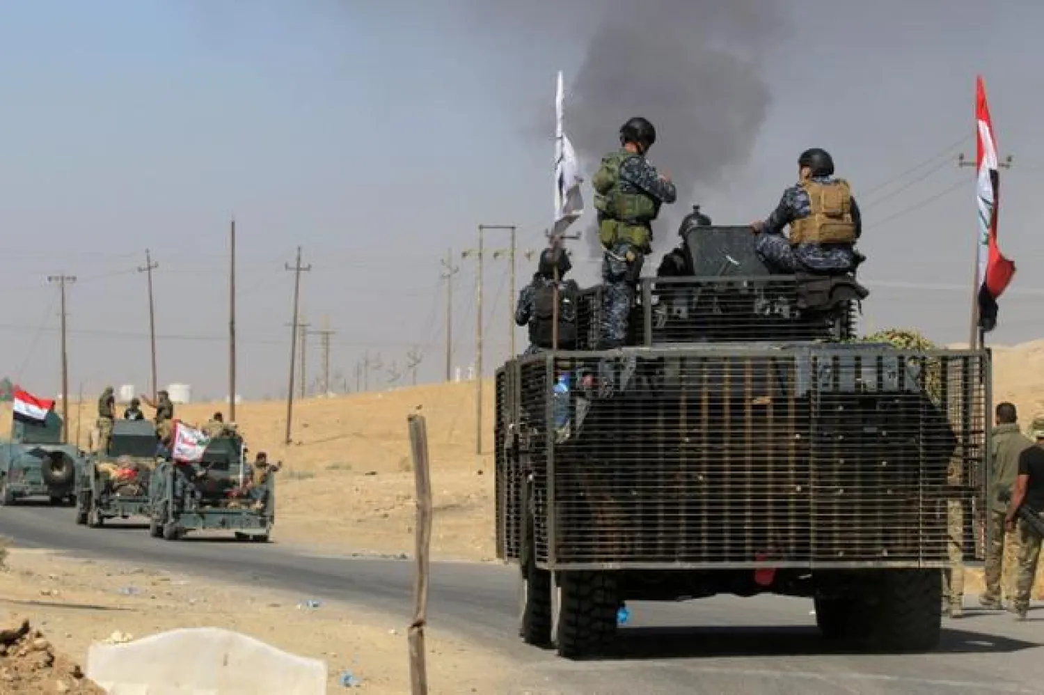 Members of Iraqi federal forces on the outskirts of Kirkuk, Iraq | Photo: Reuters