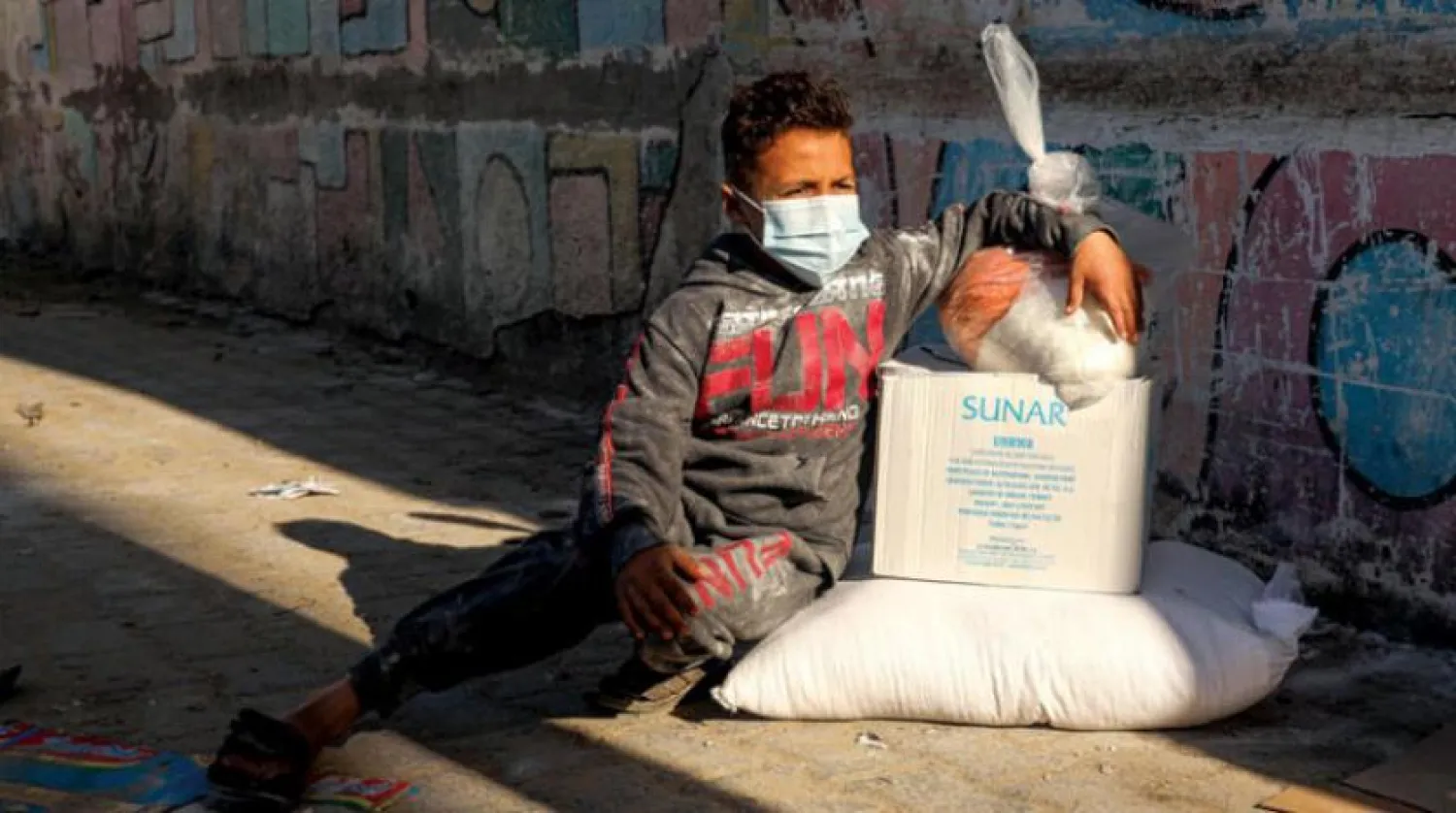 Gazze’de Trump yönetimi tarafından mali desteğin kesildiği UNRWA gıda yardımı. (AFP)