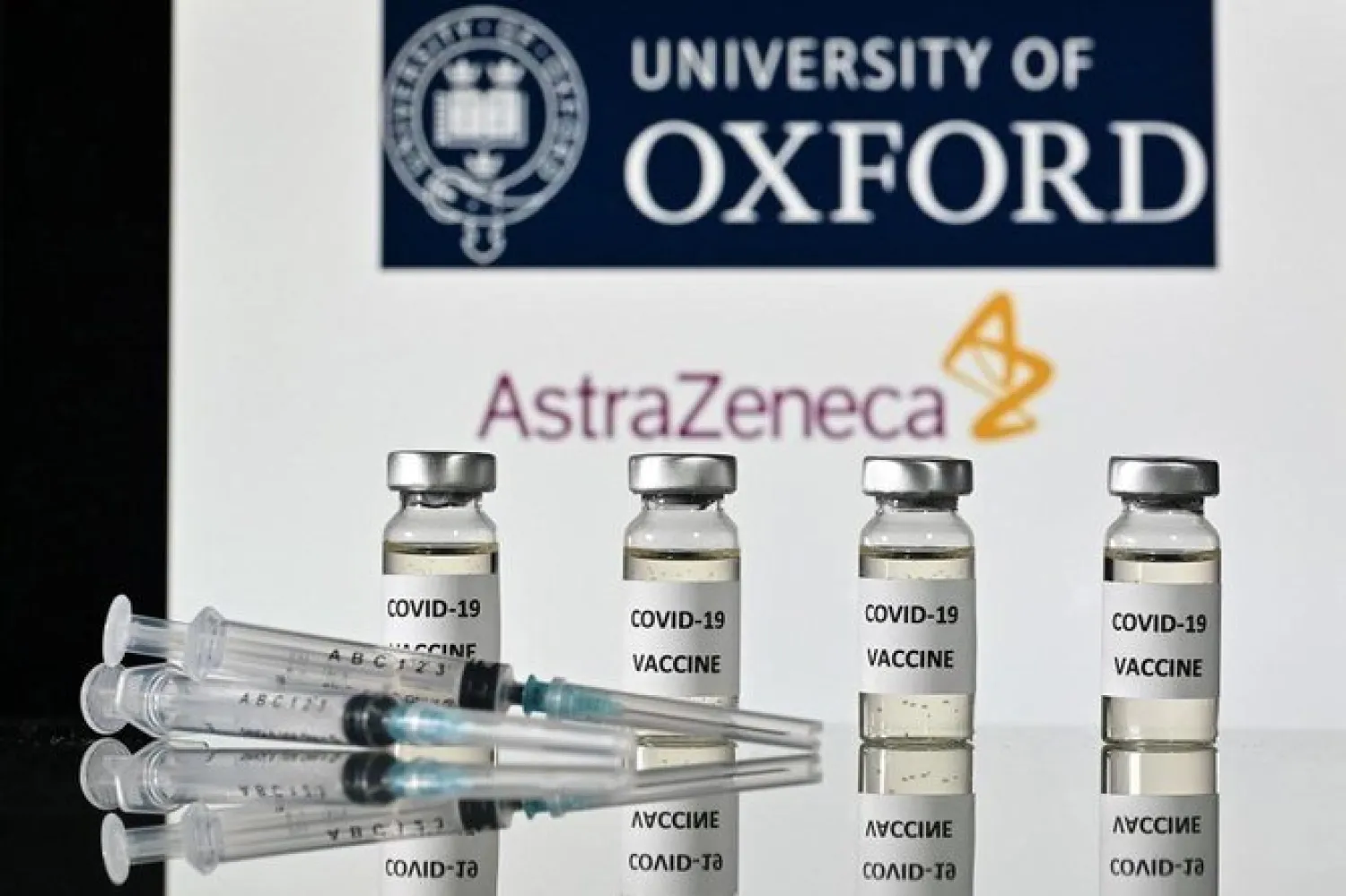 This file illustration photo taken on Nov.17, 2020 shows vials with COVID-19 Vaccine stickers attached and syringes, with the logo of the University of Oxford and its partner British pharmaceutical company AstraZeneca. (File/AFP)
