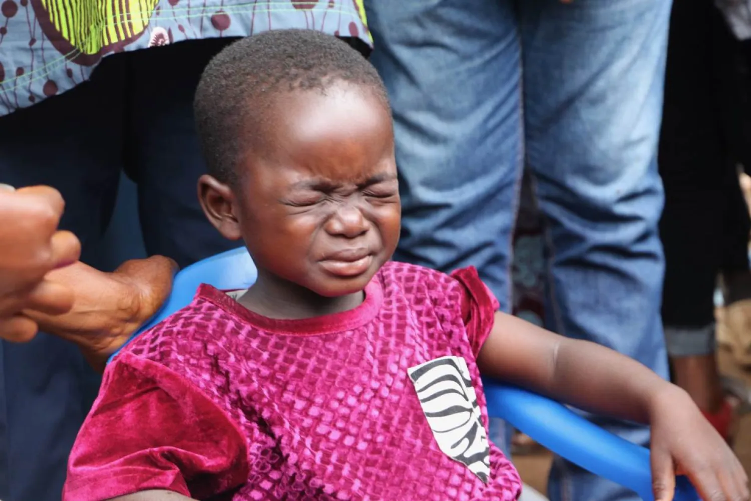  A boy makes a face after taking his malaria treatment in Moaga
village, Burkina Faso. September 11, 2020. Thomson Reuters
Foundation/Sam Mednick