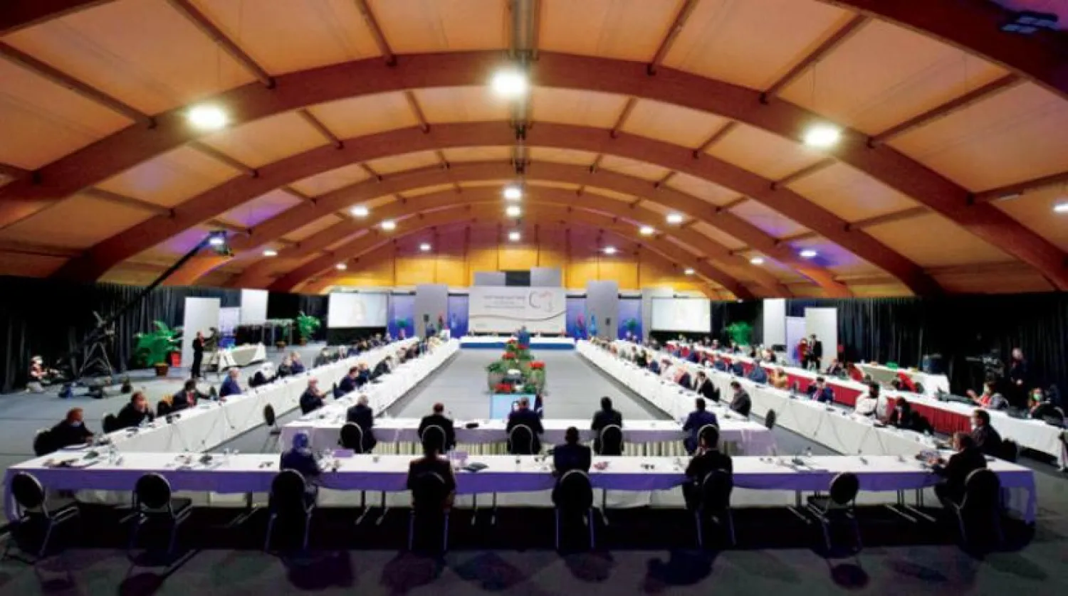 Pazartesi günü Cenevre’de yapılan Libya konulu toplantılardan bir kare (AFP)