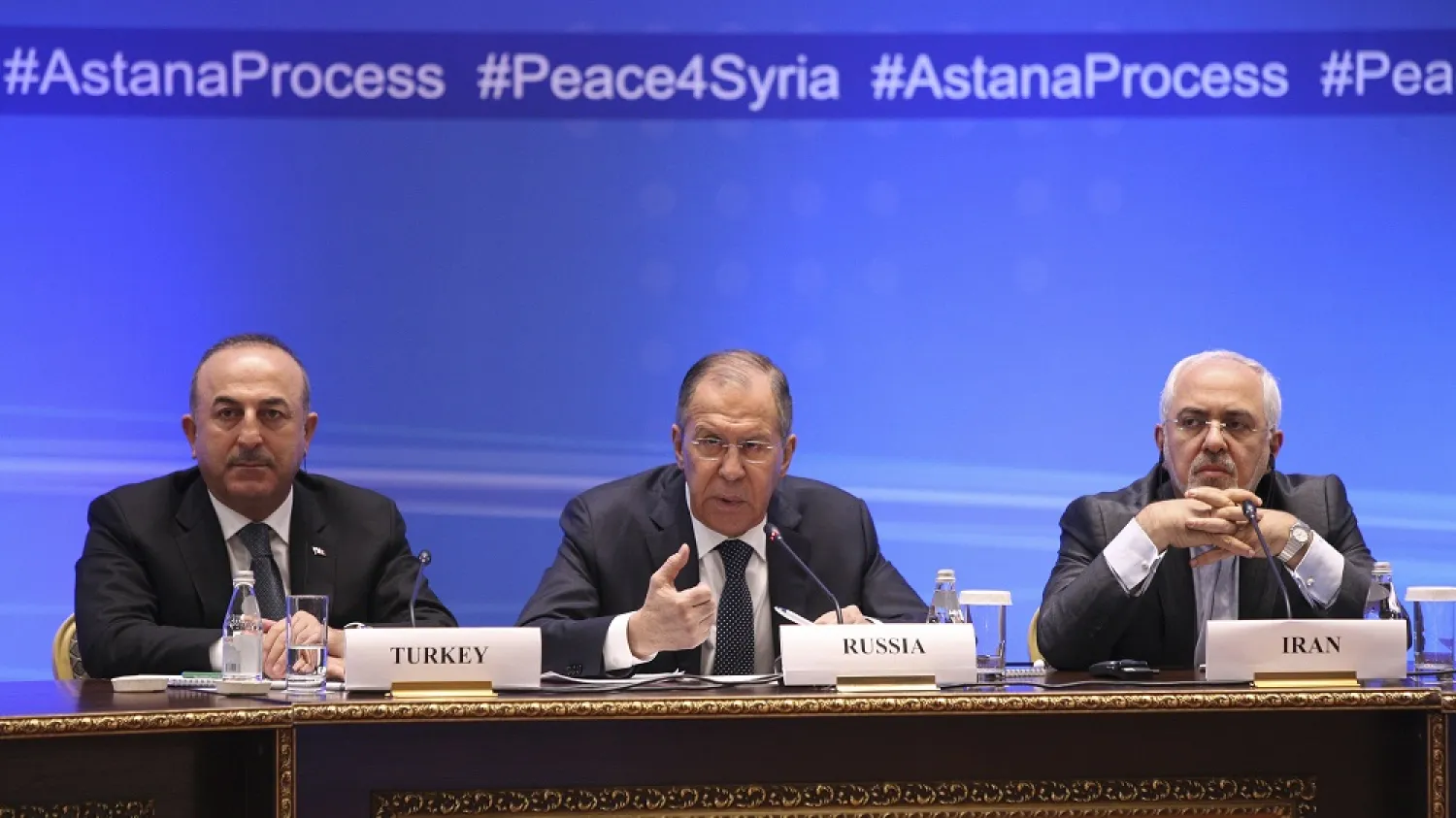 Foreign Ministers Sergei Lavrov (C) of Russia, Mevlut Cavusoglu (L) of Turkey and Mohammad Javad Zarif of Iran attend the international meeting on Syria in Astana, Kazakhstan, March 16, 2018. (Reuters)