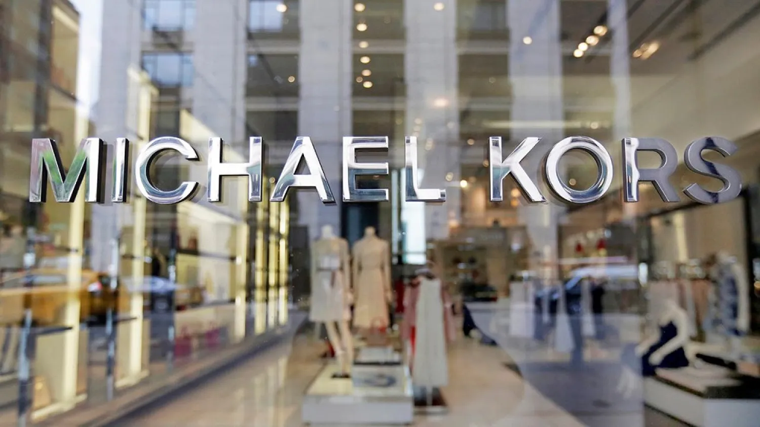 In this May 31, 2017 file photo the Michael Kors name adorns his store on Madison Avenue, in New York. (AP)