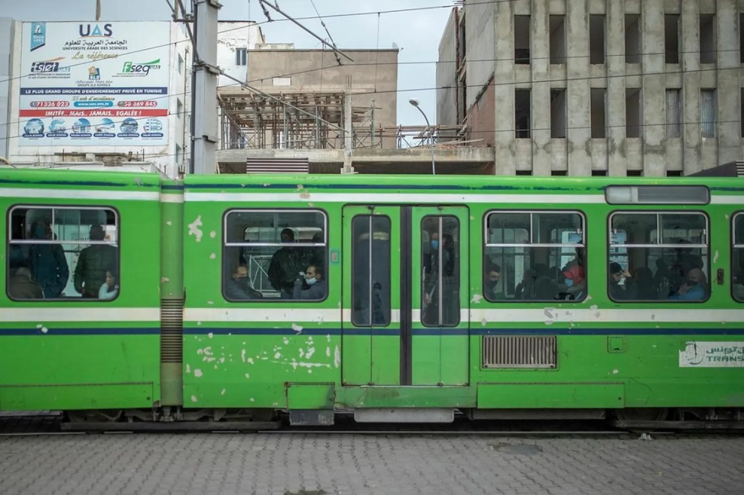 Commuters pack out a tram during rush hour in downtown Tunis, Tunisia. (AP)