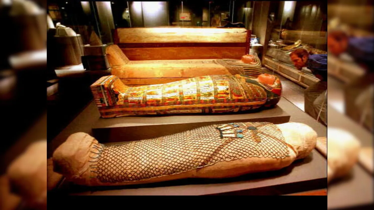 An Egyptian mummy shown in three stages (AP)