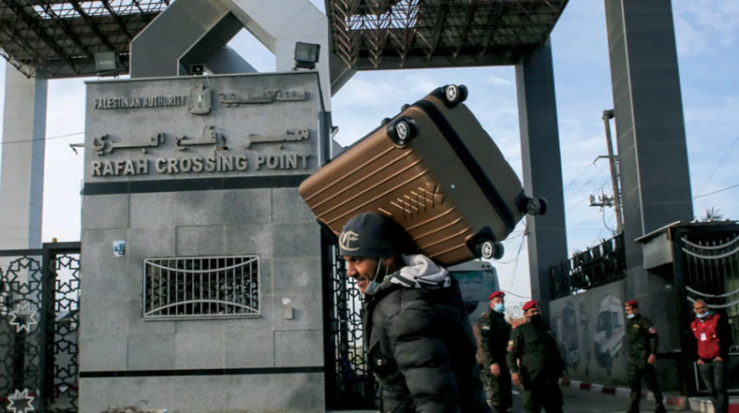 إعادة افتتاح معبر رفح الفاصل بين غزة ومصر أمس (أ.ف.ب)
