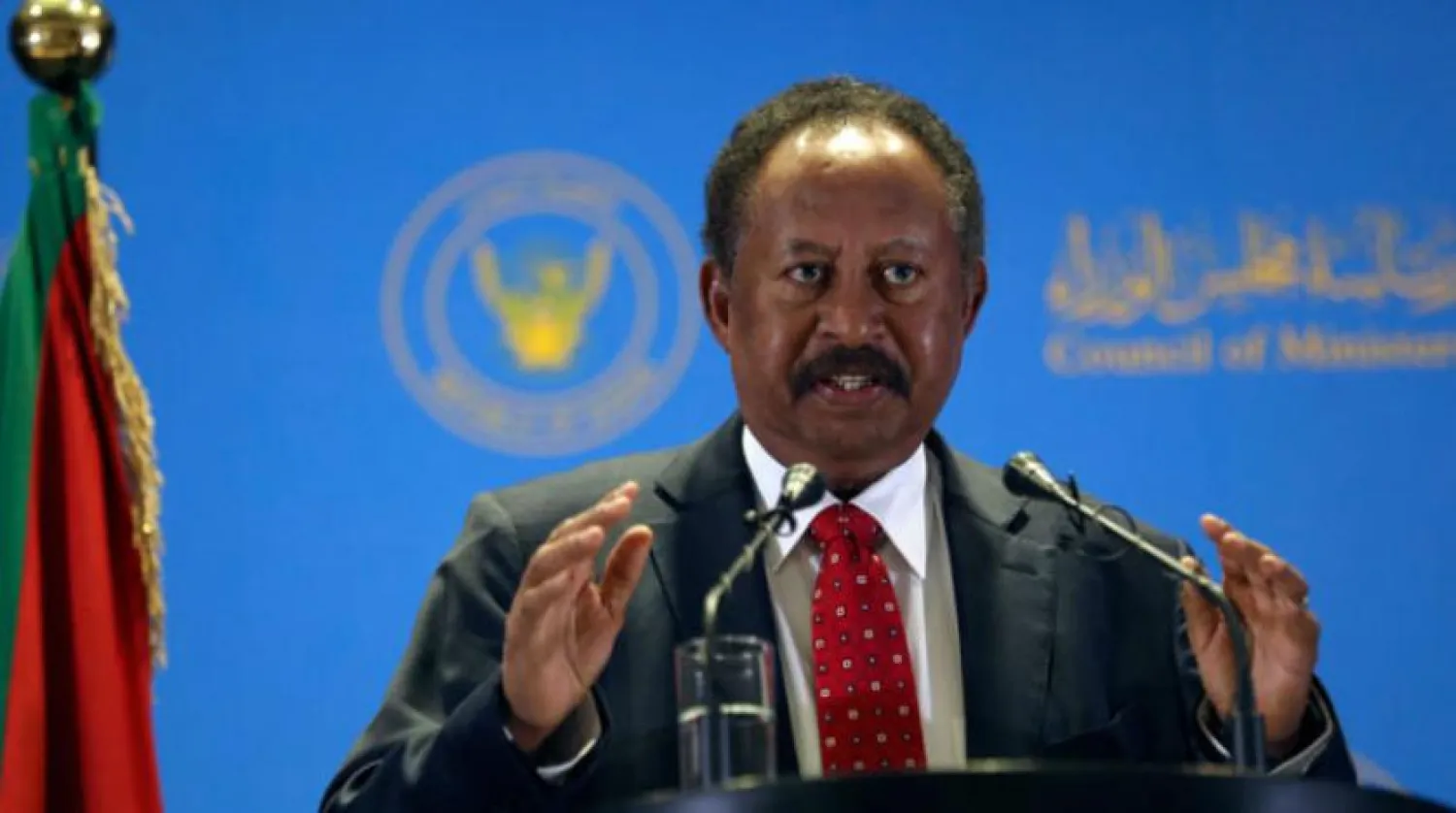 Başbakan Abdullah Hamduk dün Hartum'da yeni hükümetini tanıtırken (AP) 