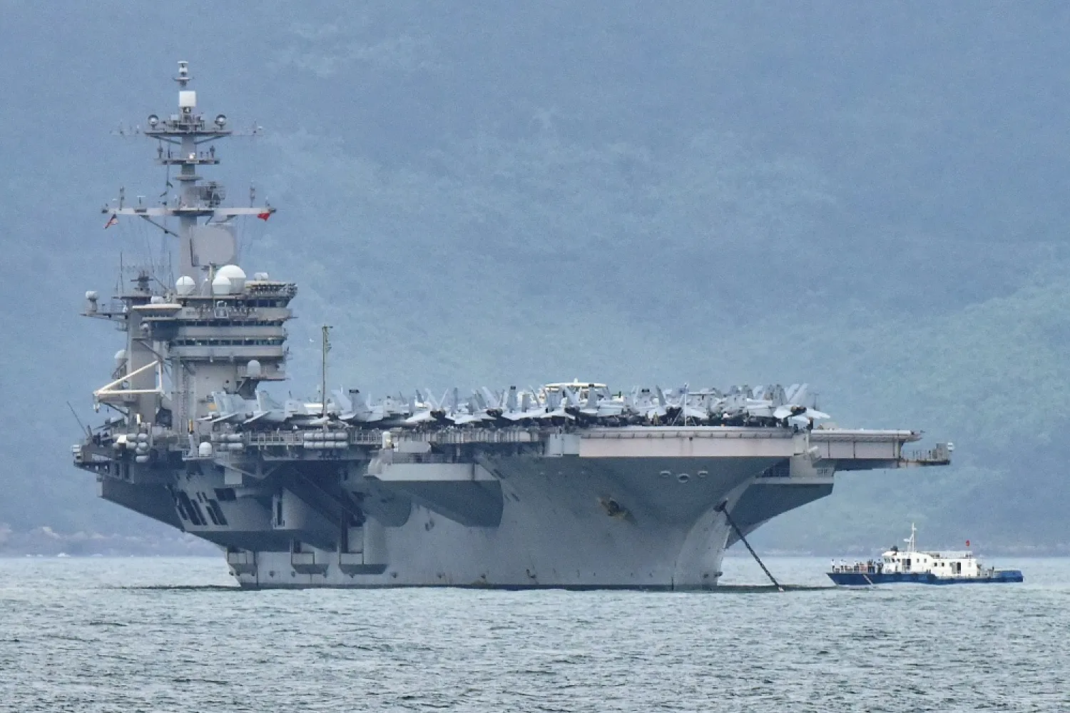 The USS Theodore Roosevelt (CVN-71) is pictured as it enters the port in Da Nang, Vietnam, March 5, 2020. (Reuters)
