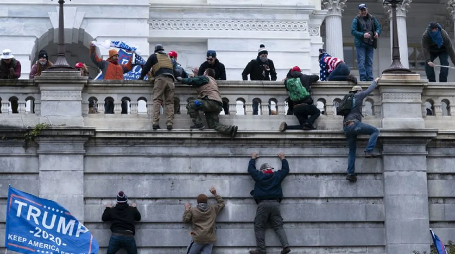 6 Ocak'ta ABD Kongre binasına baskın düzenleyen protestocular  (AP)