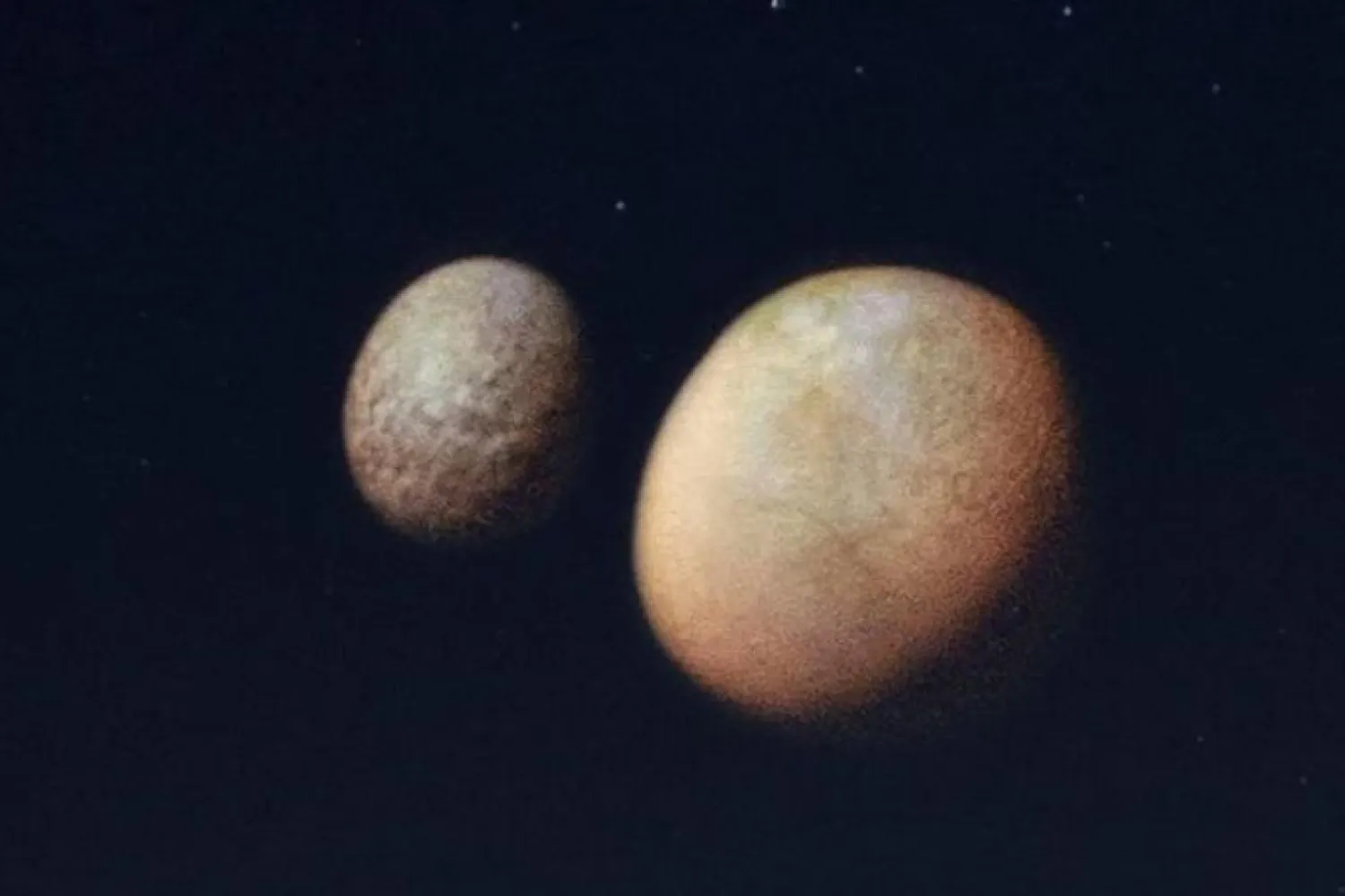 Dubai'nin Al Qudra bölgesinde gökyüzüne yansıtılan, Mars'a ait iki doğal uydunun görüntüsü (BAE Medya Ofisi)