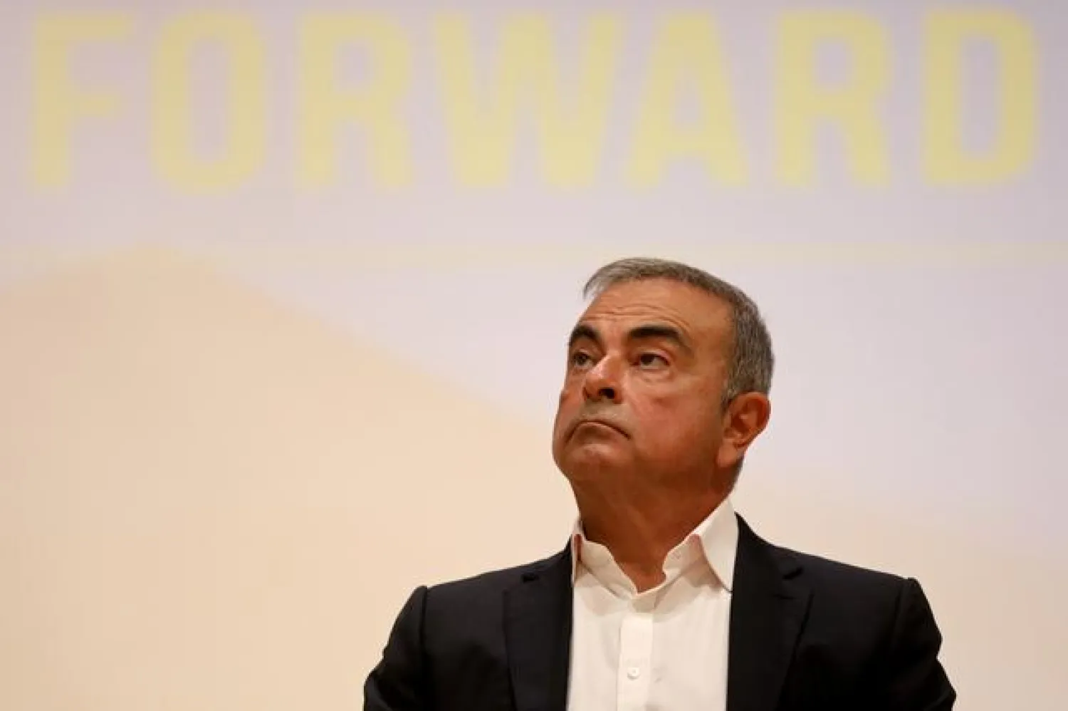 FILE PHOTO: Carlos Ghosn, the former Nissan and Renault chief executive, looks on during a news conference at the Holy Spirit University of Kaslik, in Jounieh, Lebanon September 29, 2020. REUTERS/Mohamed Azakir/File Photo

