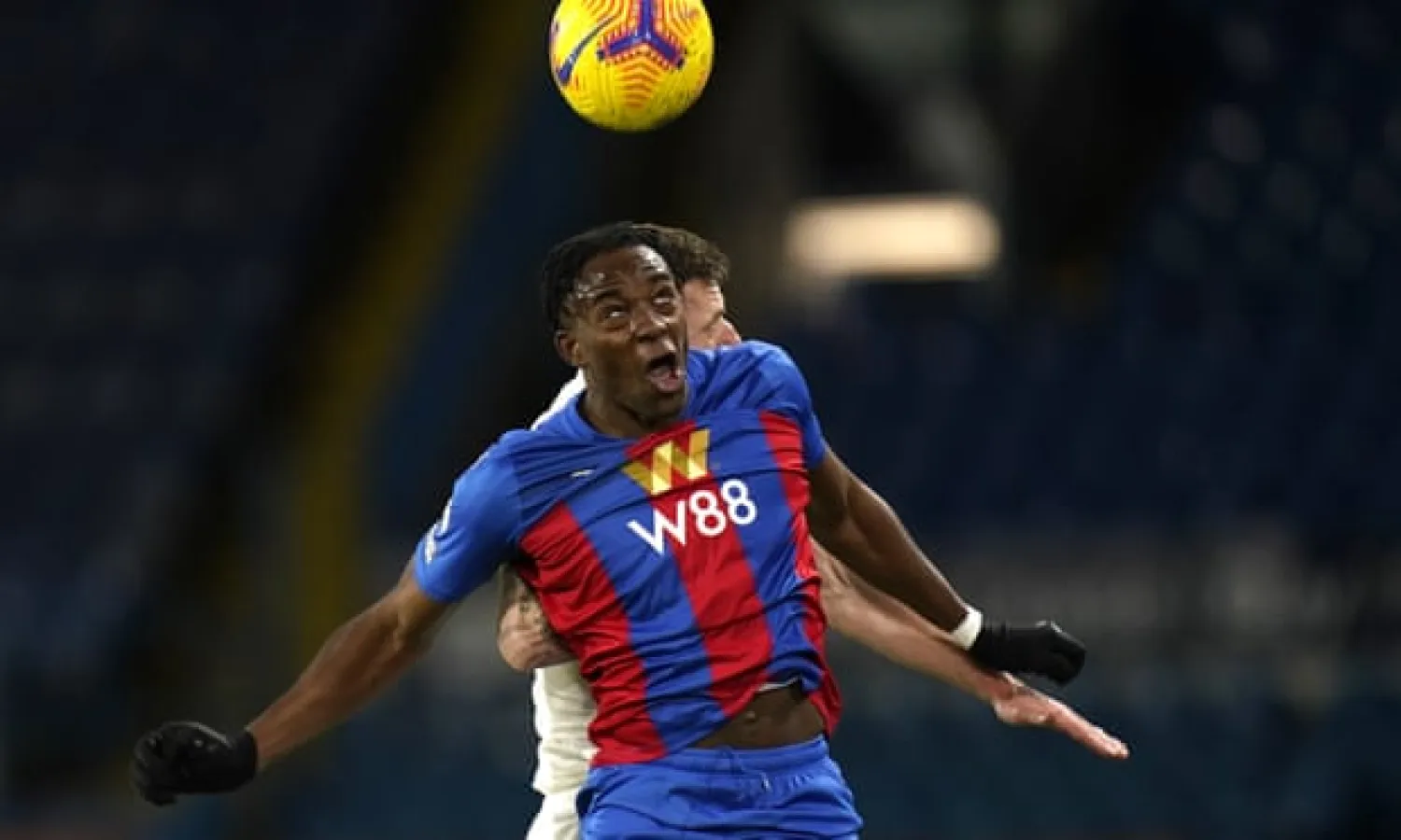 Jean-Philippe Mateta contests a header during his Crystal Palace debut against Leeds on Monday. Photograph: Tim Keeton/AP