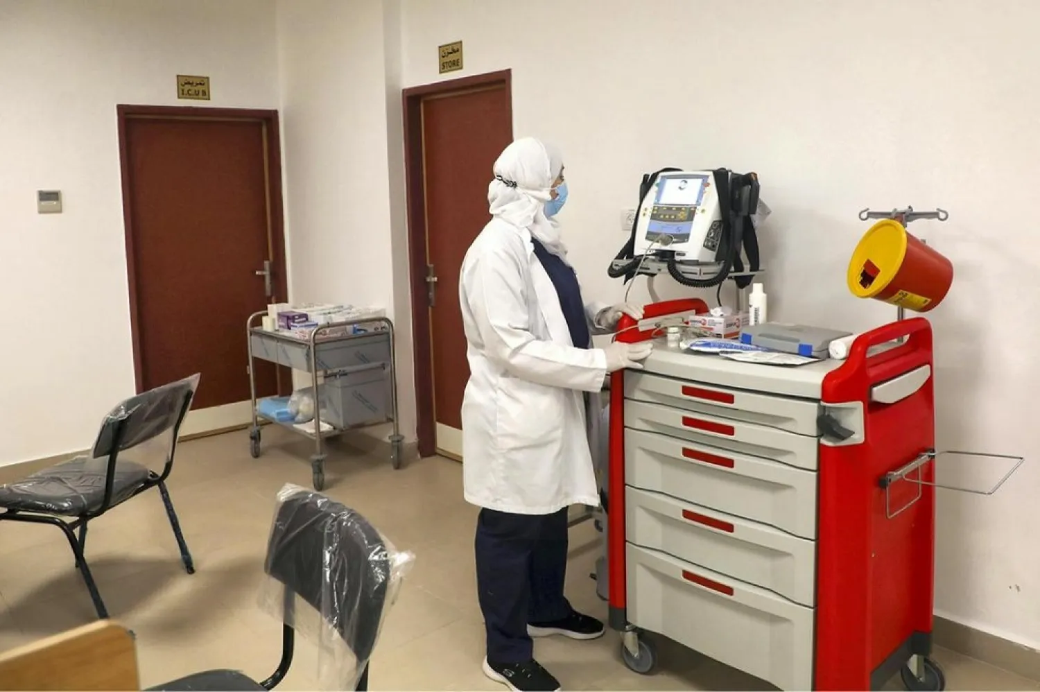 Palestinian medical staff are pictured in the newly opened Red Crescent Hospital dedicated to coronavirus, in the occupied-West Bank city of Nablus. (AFP)
