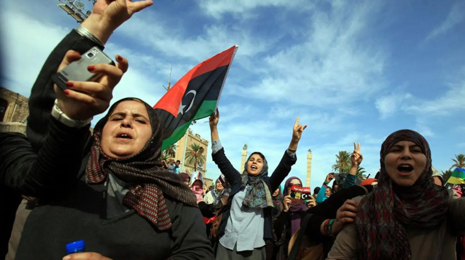 Kaddafi rejimini yıkan Şubat Devrimi’ni kutlayan Libyalılar (AFP)