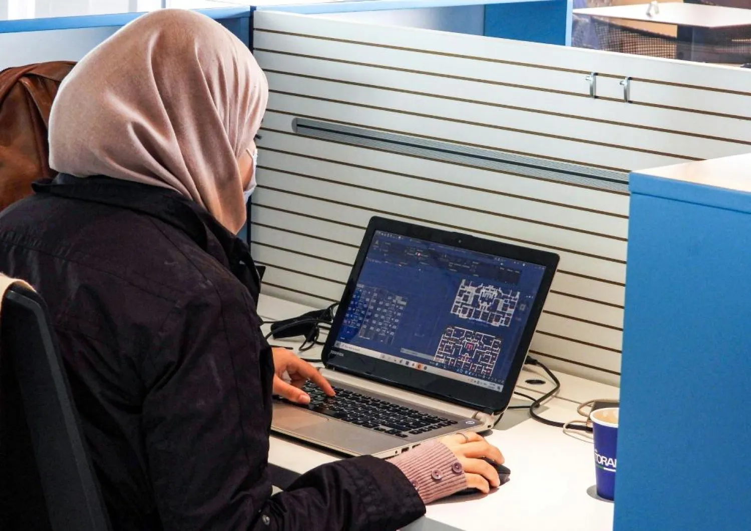 In troubled Libya's capital Tripoli, where electricity, internet, and water cuts can last several hours, co-working spaces are a popular solution for some | AFP