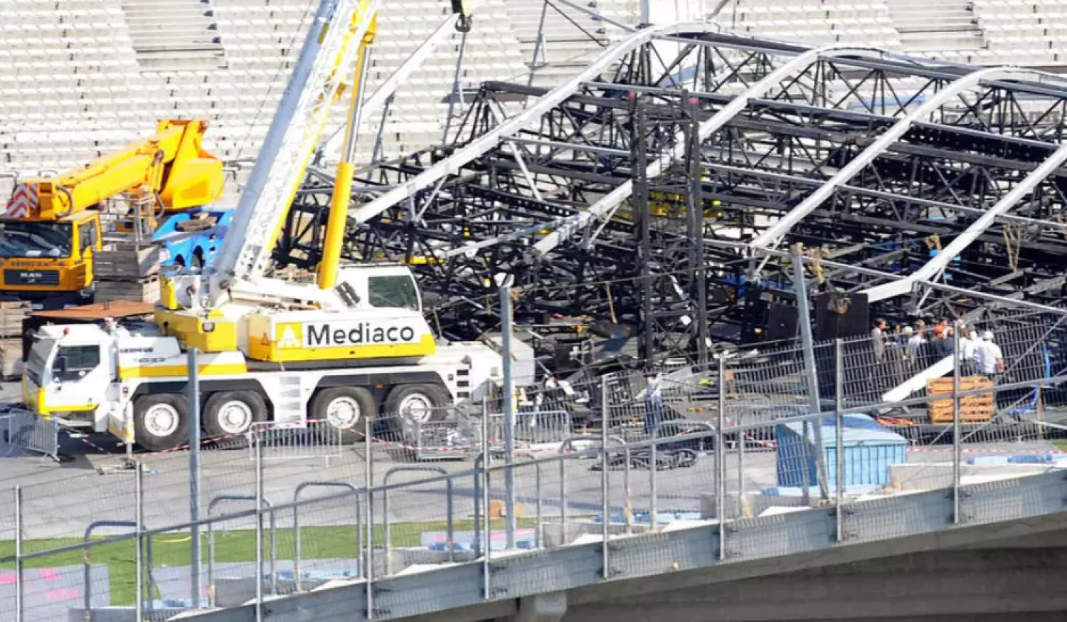The accident occurred when one of four cranes putting up metal scaffolding for the stage knocked into the structure's roof in 2009. AFP file photo