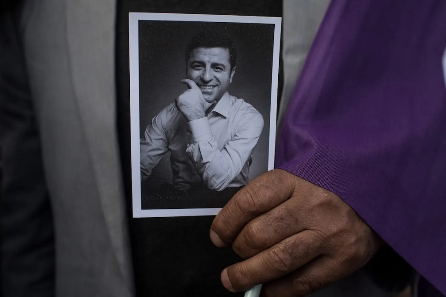 A supporter of the Pro-Kurdish Peoples' Democratic Party (HDP) holds a picture of Selahattin Demirtas on May 4, 2018 in Istanbul, Turkey. (Getty Images)