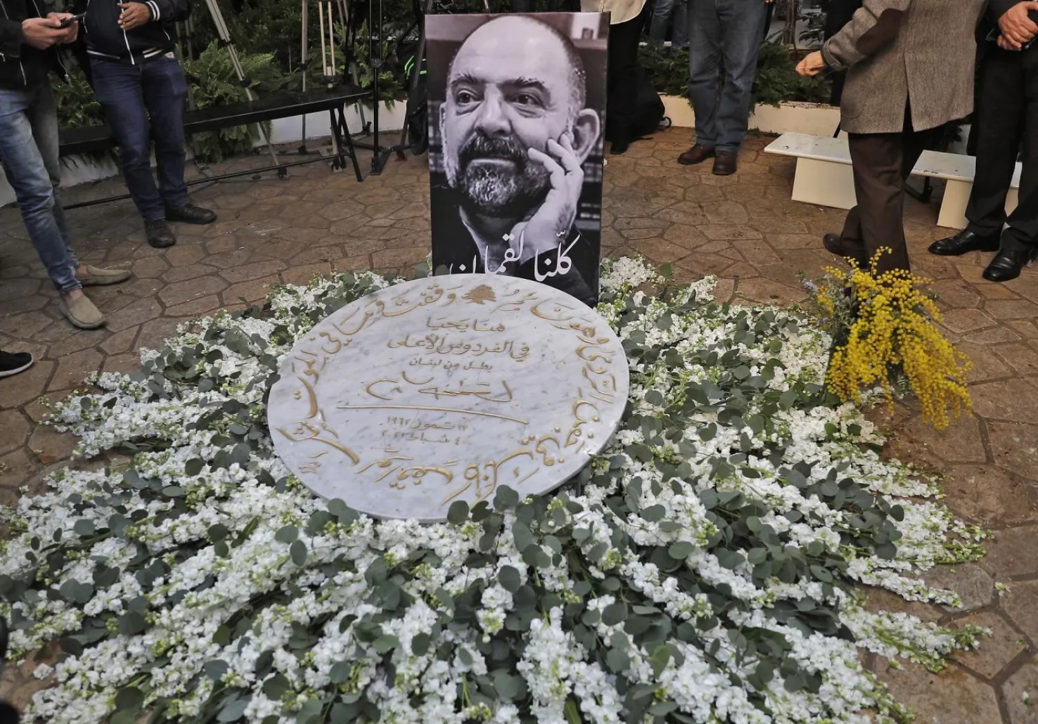 A memorial ceremony for Lokman Slim in garden of family residence in Beirut, on February 11, 2021. AFP