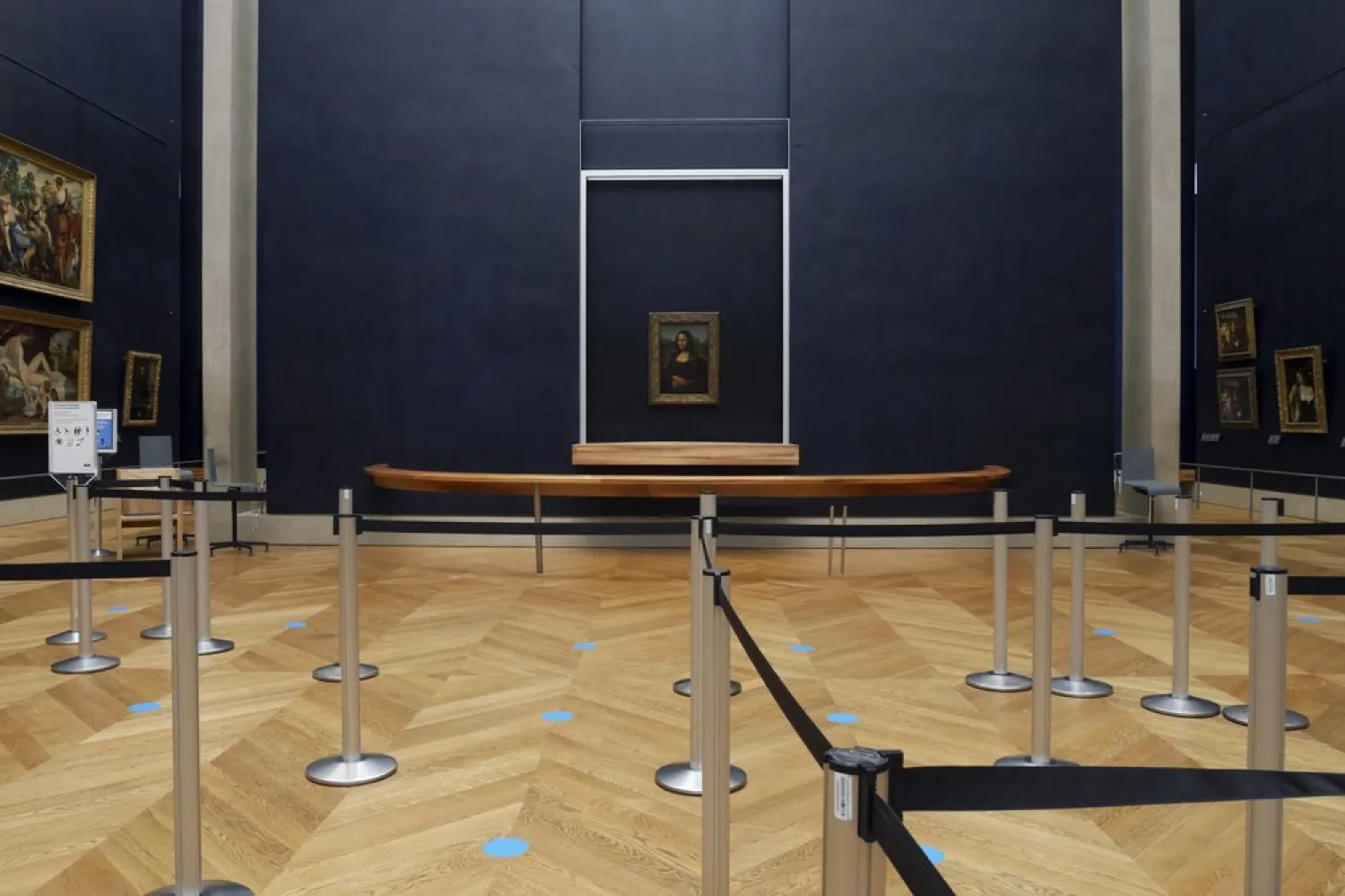 Leonardo da Vinci's Mona Lisa hangs on the wall in a deserted Louvre museum, in Paris, Thursday, Feb. 11, 2021. (AP)
