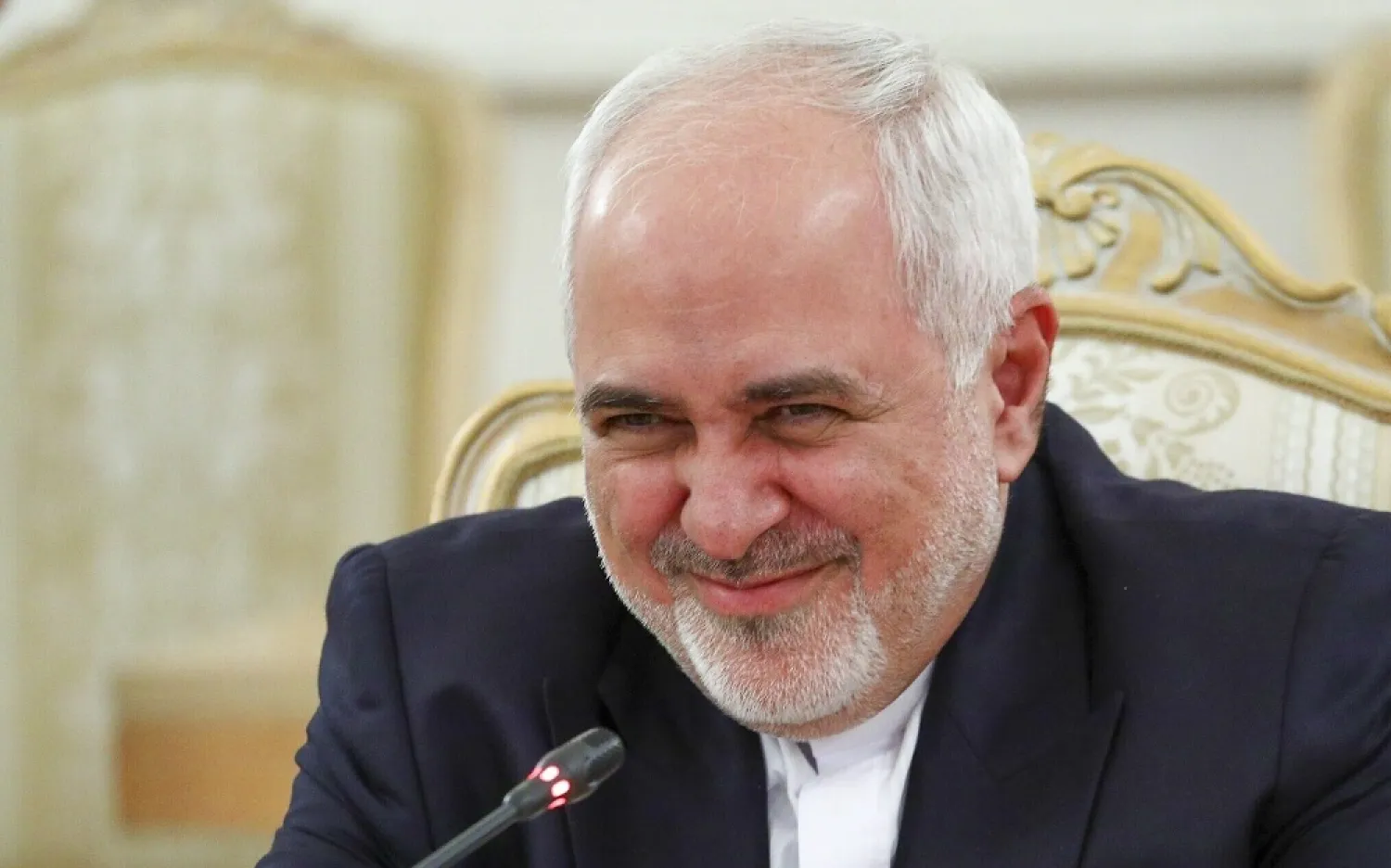 Iranian Foreign Minister Mohammad Javad Zarif smiles during talks in Moscow, Russia, September 24, 2020. (AP)