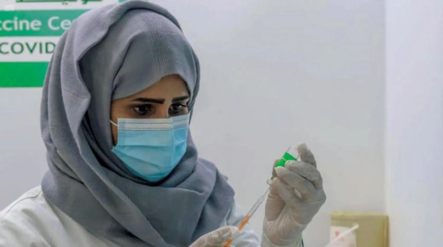 The first dose of the coronavirus vaccine is administered at the newly inaugurated inoculation center in al-Baha. (SPA)