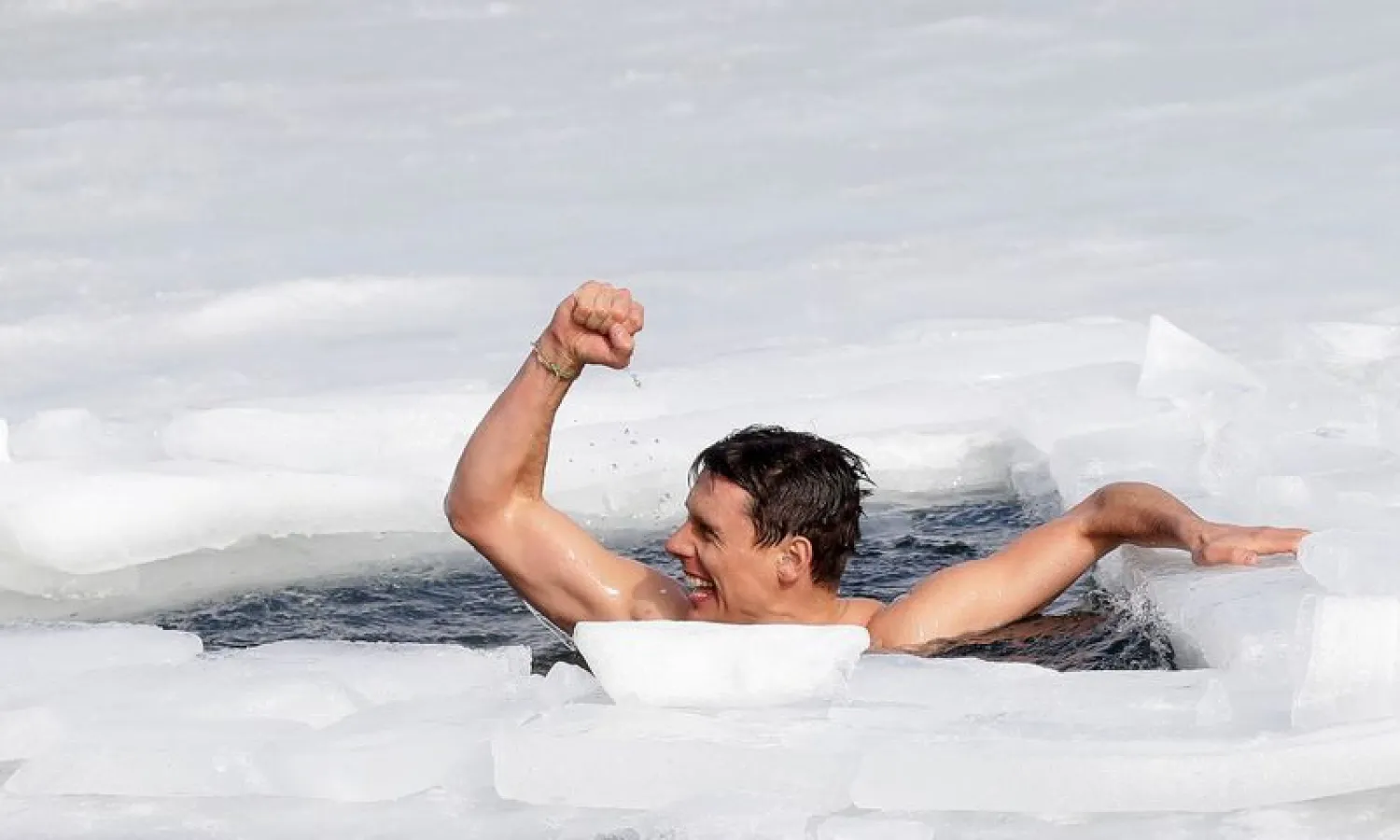 Czech free-diver David Vencl reacts after breaking the new world record in under-ice swimming in a lake in the village of Lahost near the city of Teplice, Czech Republic, February 23, 2021. (Reuters)