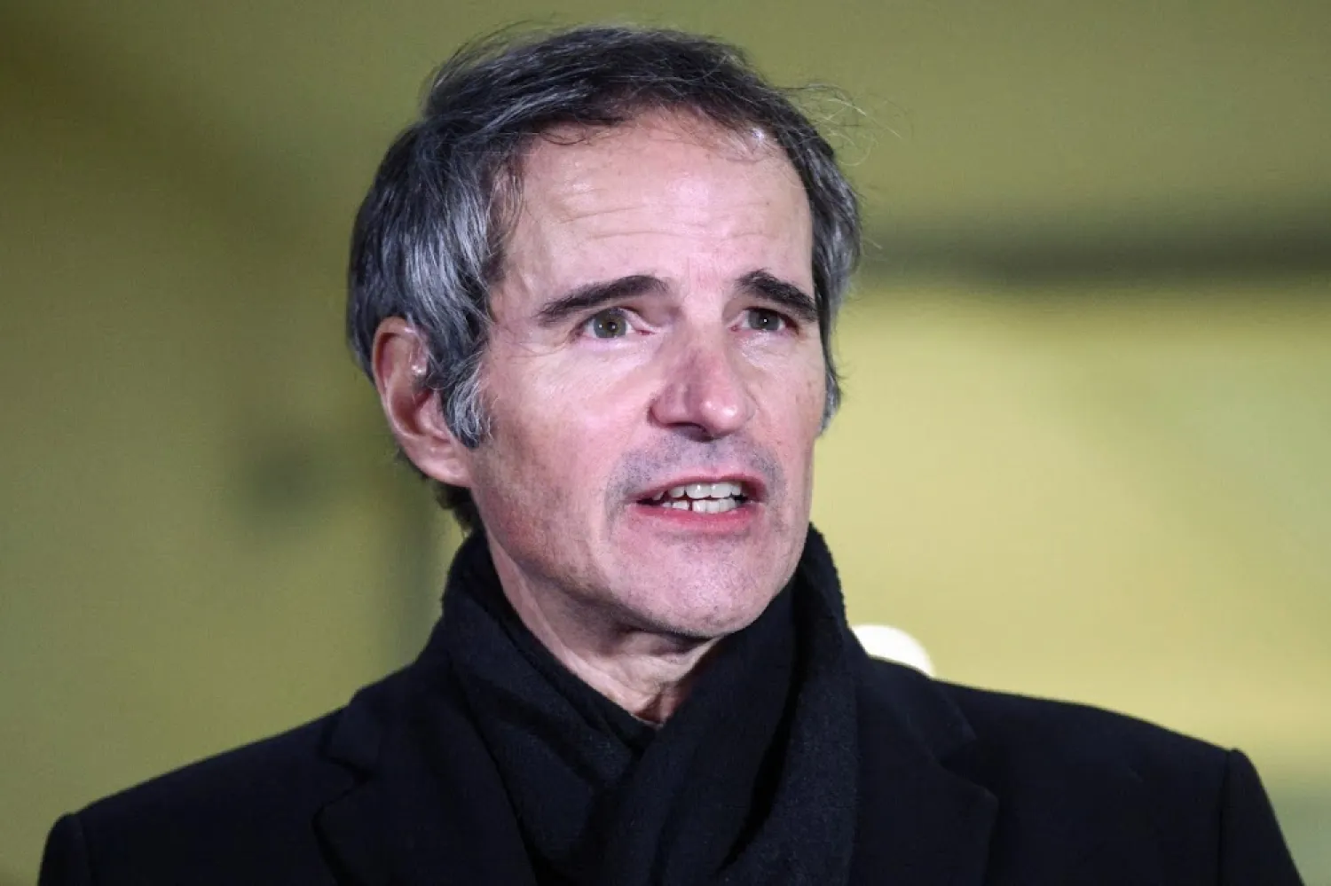 IAEA Director General Rafael Grossi addresses the media upon his arrival from Tehran, at Vienna International Airport in Schwechat, Austria February 21, 2021. (Reuters)