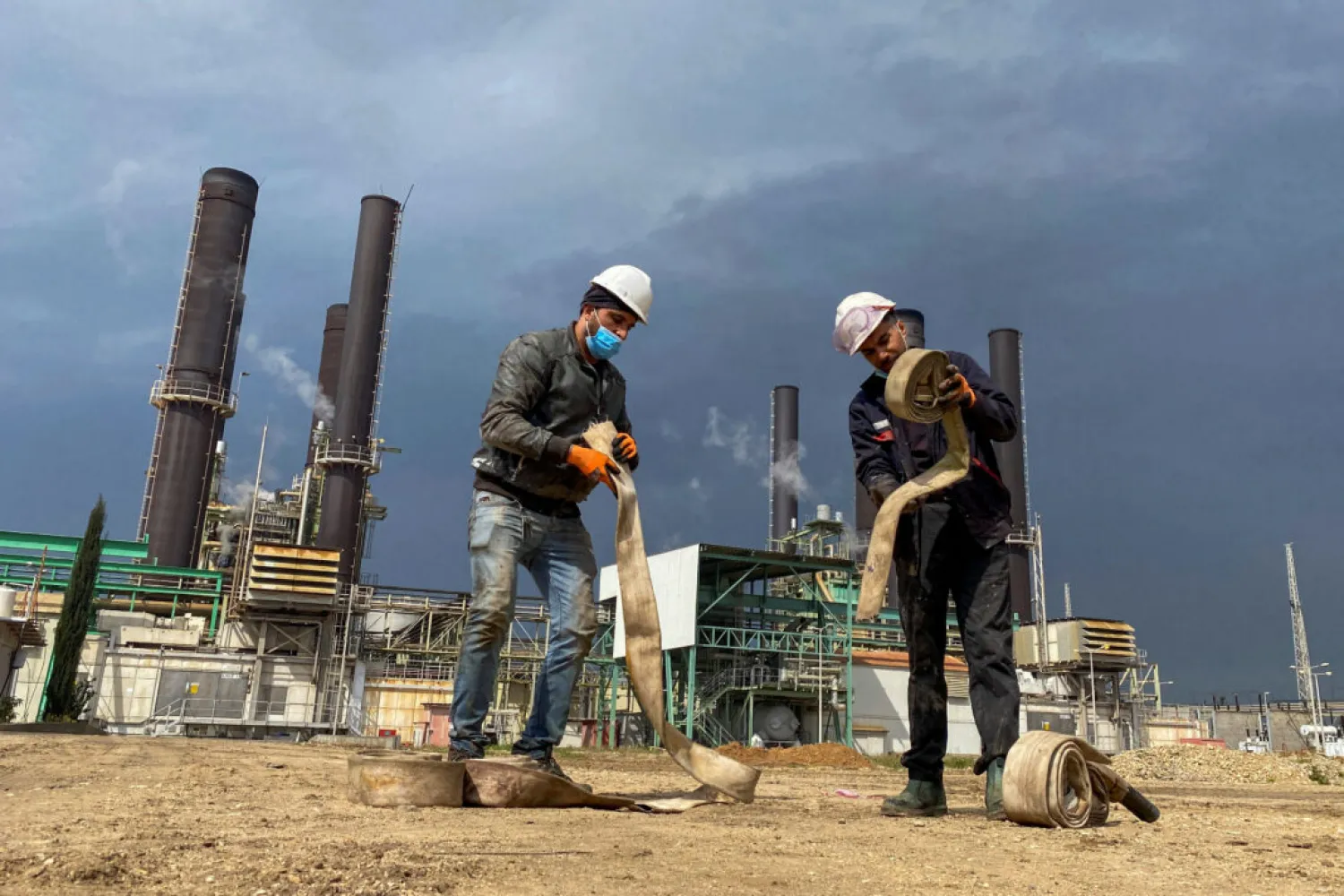 Workers are seen at Gaza's lone power plant, in the central Gaza Strip February 23, 2021. (Reuters)