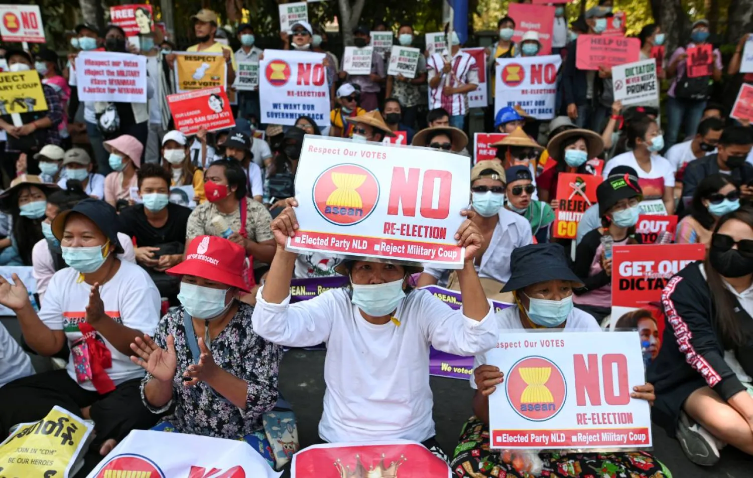 File photo: Demonstrators hold placards during a rally against the military coup in front of the Indonesian embassy in Yangon, Myanmar, February 24, 2021. Reuters