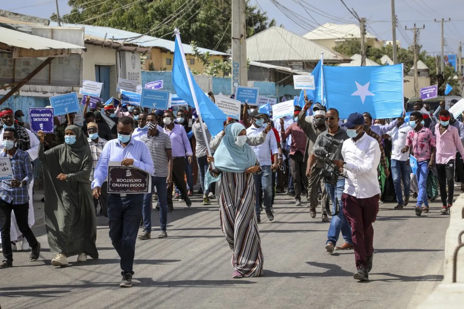 Somalis march and protest against the government and the delay of the country's election in the capital Mogadishu, Somalia Friday, Feb. 19, 2021. (AP Photo)
