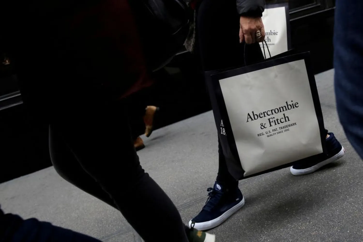 A person carries a bag from the Abercrombie & Fitch store on Fifth Avenue in Manhattan, New York City, US | Photo: REUTERS