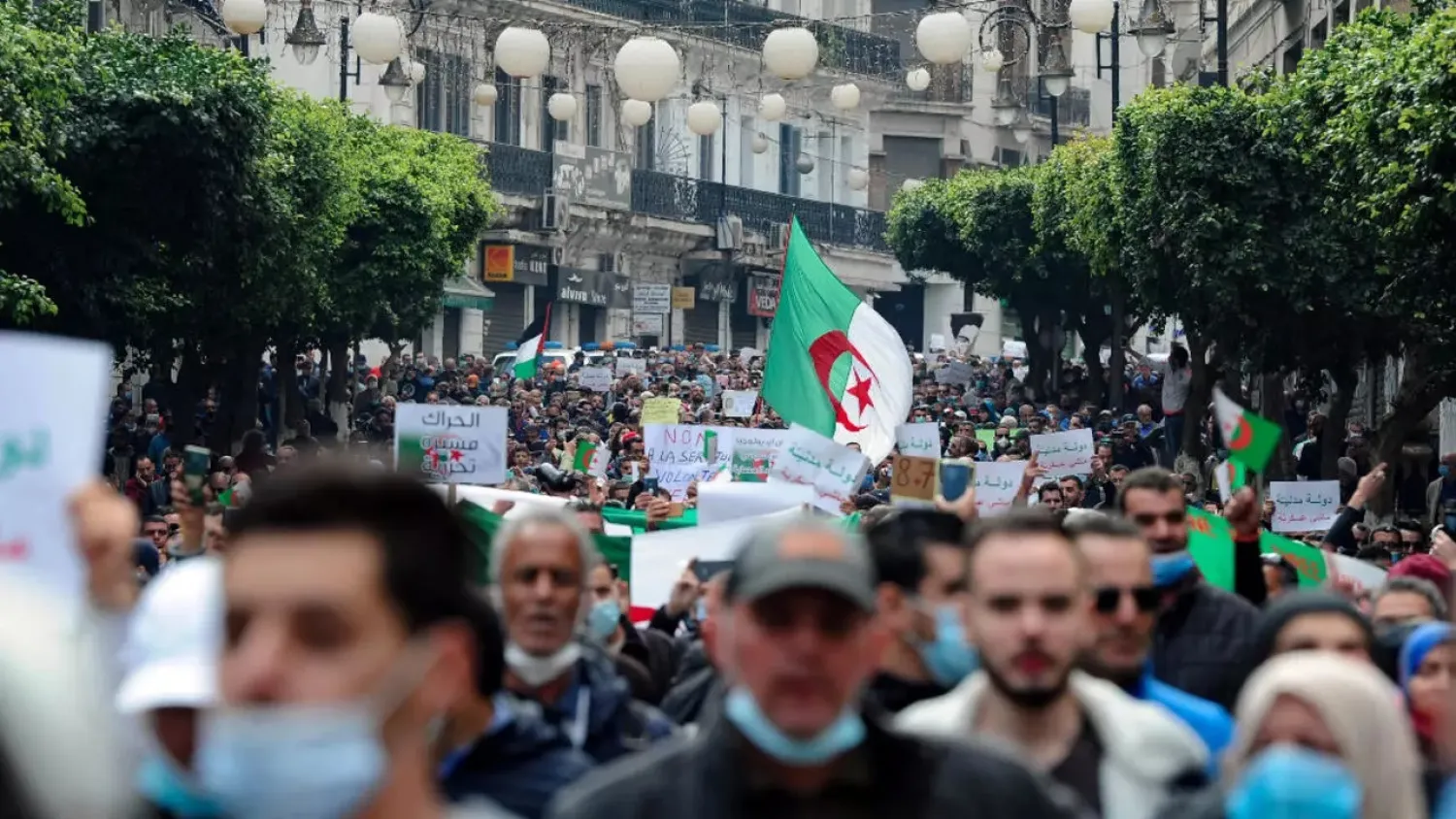Algerian anti-government protesters take to the streets of the capital Algiers on February 26, 2021. (AFP)